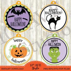 four halloween tags with the words happy halloween and a black cat on one side, an orange