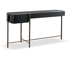 a black console table with gold legs