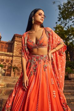 Dolly J | Orange Luckhnavi Lehenga Cape Set | INDIASPOPUP.COM Lehenga Cape, Kamdani Work, Lucknowi Lehenga, Dolly J, Orange Lehenga, Drape Sarees, Cape Set, Indian Dresses Traditional, Cocktail Gowns