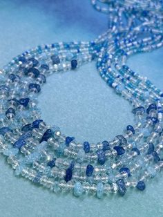 -Listing is for one 50 inch tie-on waist bead -Created on a durable polyester string -Genuine faceted Rondelle glass crystal beads -Colors: shades of blue and white, accentuated with clear crystals and crackled glass chips This waist bead has matte and glossy seed beads. It is accentuated with blue crackle glass chips and clear glass crystal beads in the middle. The effect is a nice blend of blue and white with a ton of sparkle sprinkled throughout. If you love sparkly beads and need some bling Body Beads, Crystal Waist Beads, Beads Colors, Colors Shades, Body Awareness, Waist Beads, Cotton String, Crackle Glass, Belly Chain