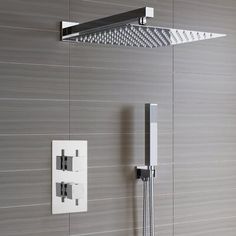 the shower head and handset are attached to the wall