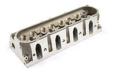 an aluminum cylinder head on a white background