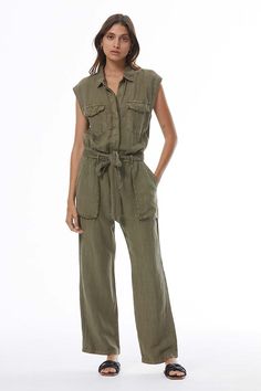 All-and-done styling.| Collared jumpsuit | Cap sleeve | Covered buttons | Flap chest pockets | Large hip pockets | Optional waist tie | Elasticized back | Crop wide leg| Linen blend fabrication| Available in seasonal colors | 55% Linen // 45% Rayon | Hand wash coldBorn on the streets of LA ♡ Jumpsuit Uniform, Collared Jumpsuit, Season Colors, Covered Buttons, Waist Tie, The Streets, Cap Sleeve, Chest Pocket, Cuba