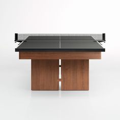 a ping pong table sitting on top of a wooden desk