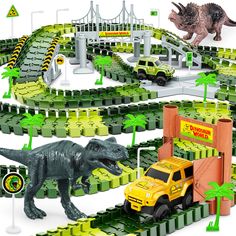 an assortment of toys including dinosaurs and cars