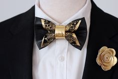 ITEM DETAILS: Boutonniere: 2"/5cm Men's bow tie: Pre-tied bow size: 4.3" x 2.5" /7x10cm Adjustable fabric strap with metal hardware to neck size: 14" - 25"/60cm . Gold Adjustable Bow Tie Suit Accessories, Black And Gold Bow Tie, Gold Satin Bow Tie For Black-tie Events, Luxury Semi-formal Men's Bow Tie, Prom For Guys, Luxury Semi-formal Bow Ties, Guys Fits, Black Bow Tie, Mens Bow Ties