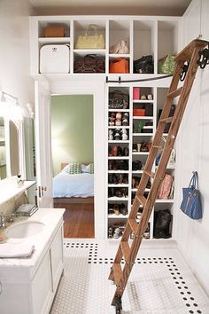 a ladder leaning up against a wall in a bathroom