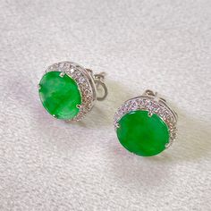 The emerald green jadeite disc earrings is made from natural real Burmese jadeite stone and genuine diamond. They are handmade items. This new collectable item is finished by our experienced designer that outlines the exceptional quality of natural jadeite and diamond by superior craftmanship. This is the perfect gift for mom, wife, fiancée, girlfriend, valentine, daughter, family or friend. It is a special gift for mother's day, valentine's day, wedding, anniversary, birthday, Christmas, Easter, New Year's and any holiday. The processing time is 3-5 business days. Everything is handcrafted with exceptional care in Hong Kong. Item is wrapped in beautiful box! Color differences can be affected by lighting at various angles, I do my best to provide product images that showcases the product's Green Round Earrings For May Birthstone, Green Earrings For May Birthstone, Round Jade Earrings For Anniversary, Green Jade Earrings For Anniversary, Green Emerald Round Earrings, Emerald Earrings In White Gold, Fine Jewelry Emerald Earrings, Round Shape, Round Emerald Earrings, Real Diamond Earrings