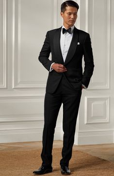 With its impeccable tailoring and satin touches, this tuxedo is hand-cut from the label's custom-developed wool barathea to exude black-tie sophistication. Jacket has one-button closure; shawl collar; nonfunctional four-button cuffs; chest welt pocket; front welt pockets; interior Trousers have zip fly with hook-and-bar closure; side welt pockets; back button-welt pockets; adjustable waist tabs Jacket is lined; trousers are lined to the knee 100% wool Dry clean Made in Italy Designer Clothing Black Tie Men, Shawl Tuxedo, Groom Tux, Black Tie Optional, Black Tie Formal, Tuxedo Wedding