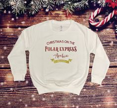 Children's Crew Neck Sweatshirt. Keep your little one warm with this jumper at Christmas!  Personalised Polar Express Family Christmas Jumper with names. Hurry up Polar Express is running! Feel festive spirits with this Polar Express concept sweatshirt is a super comfy sweatshirt.  Full Christmas range on my Etsy store! Made to order. Heat transfer vinyl. Hand wash or machine wash item inside out, at 30 degrees. Do not tumble dry. Always iron inside out to protect the design. Please note that pe Matching Christmas Jumpers, Polar Express Christmas, Family Christmas Jumpers, Shirt Concept, Christmas Personalised, Christmas T Shirt Design, Polar Express, Merry Christmas Shirts, Christmas Jumper