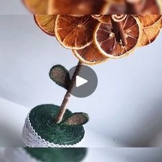 the oranges are arranged on top of each other to make a unique arrangement for someone's room