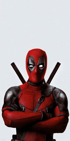 a deadpool character is standing with his arms crossed and two swords in his hands