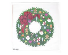 a cross stitch christmas wreath with santa and other holiday decorations