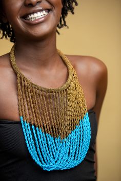 Unique African Maasai Handcrafted Beaded Necklace with an Elegant Look and Brilliant Finish. Circumference = 19 Inches / 50 Centimeters. Color = Teal Blue and Copper. **GET FREE SHIPPING FOR ADDITIONAL ITEMS PURCHASED. Yes, Buy Multiple Items and pay shipping for 1 item only- The rest ships Free. (No Limits on the number of Multiple items). With a faster delivery time of 3 days via DHLExpress, Worldwide. Ordinary/Standard Shipping also available upon request. We Custom Make to Suit Your Taste. A Epoxy Necklace, Flower Epoxy, African Inspired Decor, Woman Necklace, Handmade Beaded Necklace, Boulder Opal Pendant, Beadwork Necklace, Bracelet Accessories, Ethnic Necklaces