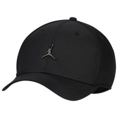 The headgear of heroes! Welcome the next level of comfort with the Jordan Jumpman Rise MTL Cap. Featuring a classic structured fit with a sloped crown and a curved bill, this cap keeps the heat off so you can feel as chill as you look. Sporting a metal Jumpman emblem, the Jordan Jumpman Rise MTL Cap lets you rep your Jordan pride in an elegant and understated style. Adjustable back strap offers a customizable fit. Sweatband provides a cool and comfortable feel. Hand wash. Body: 100% nylon; Front Black Jordan Hat, Classic Sports Trucker Hat With Curved Visor, Classic Sports Fitted Hat With Curved Visor, Classic Trucker Hat With Curved Visor For Sports, Classic Trucker Hat With Curved Bill For Sports, Classic Curved Bill Trucker Hat For Sports, Classic Fitted Hat With Curved Visor For Sports, Sports Snapback Hat With Curved Bill, Classic Snapback Hat With Curved Brim For Sports