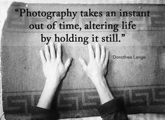 two hands on top of a rug with the quote photography takes an instant out of time, altering life by holding it still