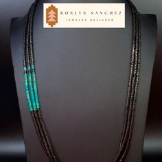 This is an all natural black jet heishi and turquoise heishi necklace w/matching earrings. Three strands with sterling cones and sterling hook and eye clasp. The earrings have sterling silver cones, earring wires, and all natural jet and turquoise heishi. This piece was created by the owner/artisan Native New Mexican - Roslyn Sanchez. Abstract indigenous jewelry. *sterling silver *natural grade AAA jet heishi *natural grade AAA turquoise heishi A Living Stone All Native Americans believe that th Southwestern Style Jewelry With Black Beads For Gift, Southwestern Style Black Beads Jewelry For Gift, Southwestern Style Black Bead Jewelry For Gifts, Black Heishi Beads Jewelry, Artisan Black Round Bead Jewelry, Artisan Black Round Beads Jewelry, Artisan Black Round Beaded Jewelry, Artisan Black Jewelry With Polished Beads, Artisan Black Jewelry With Black Beads