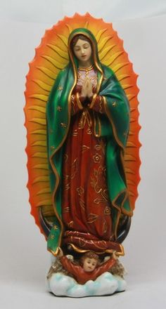 a statue of the virgin mary is shown