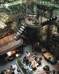 an overhead view of people sitting at tables in a restaurant