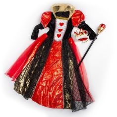 a red and black dress with hearts on it, holding a wand in its hand