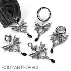 four different types of jewelry are shown in this image with the caption body art forms