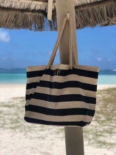 Personalised Beach Bag Striped Holiday Bag With Rope Handle - Etsy Nautical Tote Beach Bag, Nautical Beach Tote Bag, Nautical Tote Bag For Vacation, Nautical Style Tote Bag For Vacation, Navy Tote Beach Bag For Travel, Navy Rectangular Beach Bag For Travel, Nautical Beach Bag In Sail Color, Nautical Sail-colored Beach Bag, Nautical Tote Beach Bag For Travel