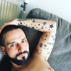 a man with stars on his arm and arms