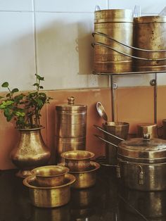 pots and pans are sitting on the counter