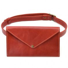 Women's red waist bag-envelope TARWA RR-1002-3md. Leather double stitched elegant belt, high-quality fittings. The waist bag is made in the shape of an envelope, it closes with a triangular flap on the button. Inside leather pocket. Bag with side inserts, which gives it roominess and volume. The belt is completely removable. If desired, you can use only the belt as a belt. Also, the bag can be used separately from the belt, as a clutch for the evening, for example. Or all together, as a stylish Red Envelope Travel Bag, Red Rectangular Belt Bag For Travel, Red Pouch Belt Bag For Travel, Red Travel Pouch Belt Bag, Red Belt Bag With Removable Pouch, Rectangular Red Belt Bag For Everyday Use, Red Rectangular Belt Bag For Everyday Use, Red Leather Crossbody Belt Bag, Red Crossbody Belt Bag With Removable Pouch