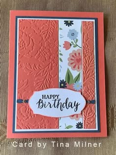 a happy birthday card with flowers on it