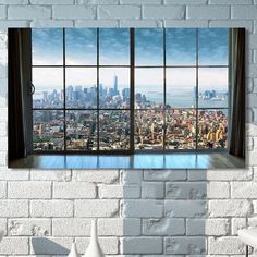 an open window with the view of a city from it's high rise, in front of a white brick wall