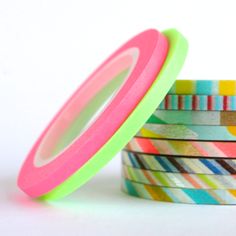 multicolored washi tape stacked on top of each other