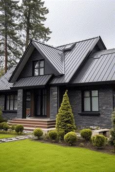 a house with a metal roof and green lawn