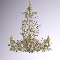 a chandelier with green flowers and leaves hanging from it's centerpiece