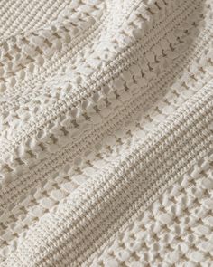 an image of a white crocheted blanket