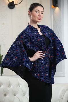 Elevate Your Style: Discover the unique charm of our Tattreez Cape with Belt, designed to enhance any outfit with elegance. Free Size Versatility: Comes in a free size, ensuring a perfect fit for any body type and providing comfort and flexibility. Unique Tattreez Design: Features traditional Tattreez embroidery, adding a touch of cultural elegance and sophistication. Customizable Fit: Includes a belt for a customizable and flattering fit, allowing you to style it to your preference. Make a Stat Elegant Embroidered Blue Shawl, One Size Blue Shawl For Festivals, Elegant Blue Shawl For Festive Occasions, Embroidery On Clothes, Unique Charms, Elevate Your Style, Formal Occasion, Plus Size Dresses, Wardrobe Essentials