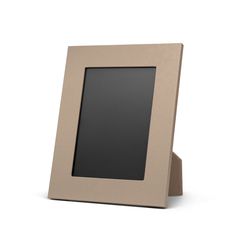 a beige frame with a black square in the middle