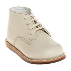 Complete his fall and winter wardrobe with the addition of these boy's chukka boots from Josmo. This lace-up style is made from smooth leather with a cushioned insole, round toe, and a rubber sole. Pair them with suiting, chinos, or jeans.Features: ComfortClosure Type: Lace-UpShoe Heel Height: FlatUpper/Outer Base Material: 100% LeatherShoe Lining Material: LeatherSole Material Content: 100% RubberToe Type: Round Toe, Closed ToeCare: Wipe CleanHeel Style: Flat HeelCountry of Origin: Imported Cream Boots With Leather Sole And Round Toe, Beige Lace-up Boots With Rubber Sole And Round Toe, Cream Leather Lace-up Boots With Round Toe, Cream Lace-up Shoes With Rubber Sole, Classic Boots With Laces And Round Toe, Beige Lace-up Boots With Rubber Sole, Beige Plain Toe Boots With Textured Sole, Classic High-top Lace-up Shoes With Rubber Sole, Casual Cream Boots With Leather Sole