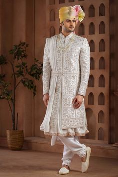 Set the perfect statement for your big day with our Wedding Wear Designer Heavy Embroidered Readymade Groom Sherwani for Men in rich colors. Dazzling heavy embroidery enriches the timeless appeal of this stylish Sherwani. Available in sizes from 34 to 52, we've ensured to cater to every physique for a perfect fit. Be it the baraat or the reception, steal the limelight effortlessly. Shop now and transform into the quintessential groom! Sherwani Wedding, Men In White, Indian Groom Dress, Mens Traditional Wear, Groom Sherwani, Stylish Men Wear, Wedding Outfits For Groom, Wedding Dresses Men Indian, Silk Anarkali