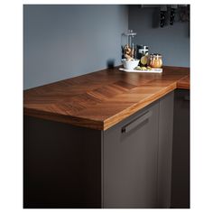 a wooden counter top in a kitchen