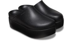 Made to mimic the look of genuine, full-grain leather mules, the Dylan Platform Clog is the newest iteration of our timeless Dylan Clog and provides a modern alternative to our Classic Clog collection. Whether you dress it up or down, you get a touch of style with the iconic comfort you love, now in an elevated silhouette.  Dylan Platform Clog Details:    2.2-inch | 5.5 cm heel height   Subtle texture on upper mimics appearance of genuine, full-grain leather   Deep heel cup for extra comfort and Modern Synthetic Clogs For Spring, Trendy Synthetic Clogs For Fall, Modern Synthetic Mules With Round Toe, Modern Synthetic Platform Clogs, Trendy Fall Synthetic Clogs, Modern Black Clogs With Removable Insole, Black Clogs With Textured Sole For Spring, Modern Slip-on Slides, Casual Synthetic Mules For Work