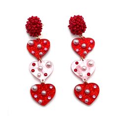 These acrylic triple heart earrings with a beaded topper are the perfect accessory to finish off any Valentine's Day look! They are very lightweight and easy to wear all day long! Measure about 3" long and secured with a post back. Love Core, Accessory Inspo, Triple Heart, Heart Crafts, Style Accessories, Heart Earrings, Ruby, Valentine's Day, Valentines Day