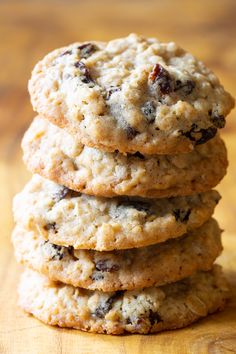 a stack of cookies sitting on top of a wooden table