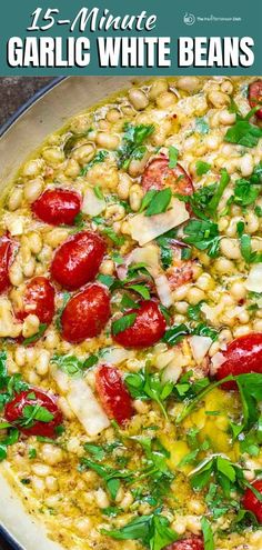 a pan filled with white beans and tomatoes