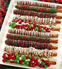 christmas pretzels are lined up on a platter