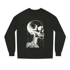 Embrace your inner darkness with our Gothic Sweatshirt featuring a simple yet striking skull design. This sweatshirt is not just a piece of clothing; it's a statement of your unique style and personality. Features: Premium Materials: Crafted with an 80% Cotton - 20% Polyester blend and a yarn thickness of 20 singles, this sweatshirt combines the softness of cotton with the durability of polyester. The 100% Cotton face ensures comfort against your skin. Medium-Heavy Fabric: With a weight of 8.5 oz/yd² (290 g/m this sweatshirt provides warmth and coziness, making it perfect for chilly evenings or those crisp autumn days. Regular Fit: The regular fit offers a comfortable, classic silhouette that complements various body types. It's designed for versatility, allowing you to wear it on its own Punk Skull Print Sweatshirt For Streetwear, Punk Sweatshirt With Skull Print For Streetwear, Halloween Skull Print Sweatshirt For Streetwear, Black Cotton Sweatshirt With Skull Print, Black Crew Neck Sweatshirt With Skull Print, Halloween Skull Sweatshirt Streetwear, Halloween Skull Sweatshirt For Streetwear, Cotton Band Merch Sweatshirt With Skull Print, Band Merch Skull Print Sweatshirt For Streetwear