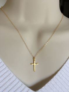 "Handmade with love! Delicate Cross necklace is great gift ideas for Mom, for your wife, for birthday, for Baptism, Christmas, Mother's day, gift for her, for mom, grandma, best friend, sister, daughter, bridesmaid gift.... MATERIALS: - Silver Plated chain and components. - Sterling silver Cross size 11.6mm x 20.6mm. - The model is wearing a 18\" inches necklace from end to end. - Gold Plated chain and components. - Gold Plated Cross. HOW TO ORDER: ** Please click on the drop down menu select ne Simple Cross Jewelry For Gifts, Simple Gold Cross Necklace As A Gift, Valentine's Day Cross Pendant Jewelry Gift, Valentine's Day Gift Cross Pendant Jewelry, Valentine's Day Wedding Cross Jewelry, Cross Charm Necklaces For Mother's Day Gift, Mother's Day Gift Charm Necklaces With Cross Shape, Cross Necklaces For Birthday And Mother's Day, Cross Necklace For Birthday And Mother's Day