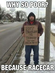 a man holding a sign that says not homeless or hungry