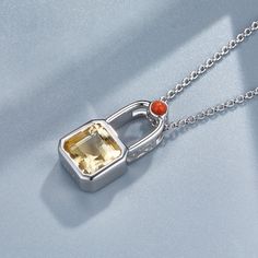 This Lock Necklace is set with the citrine and nanhong that symbolize wealth and good luck. Perfect for everyday wear, enhance your style and attract prosperity with this unique necklace. Material: 925 silver plated with platinum Gemstones: natural citrine, natural nanhong Pendant: 1.5*2cm Chain length: 45+5cm Silver Citrine Necklaces With Birthstone, Silver Citrine Birthstone Necklaces, Fine Jewelry Silver Citrine Necklace, Silver Citrine Necklace In Fine Jewelry Style, Silver Citrine Birthstone Necklace, Silver Citrine Necklace With Birthstone, White Gold Citrine Necklaces With Gemstones, Silver Citrine Gemstone Necklaces, Silver Citrine Gemstone Necklace