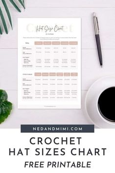 the crochet hat sizes chart is displayed on a table next to a cup of coffee